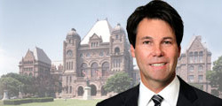 Photo of Honourable Dr. Eric Hoskins, Minister of Children and Youth Services